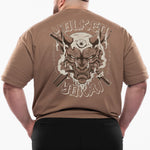 Man wearing a brown t-shirt with a graphic design on the back, standing against a white background