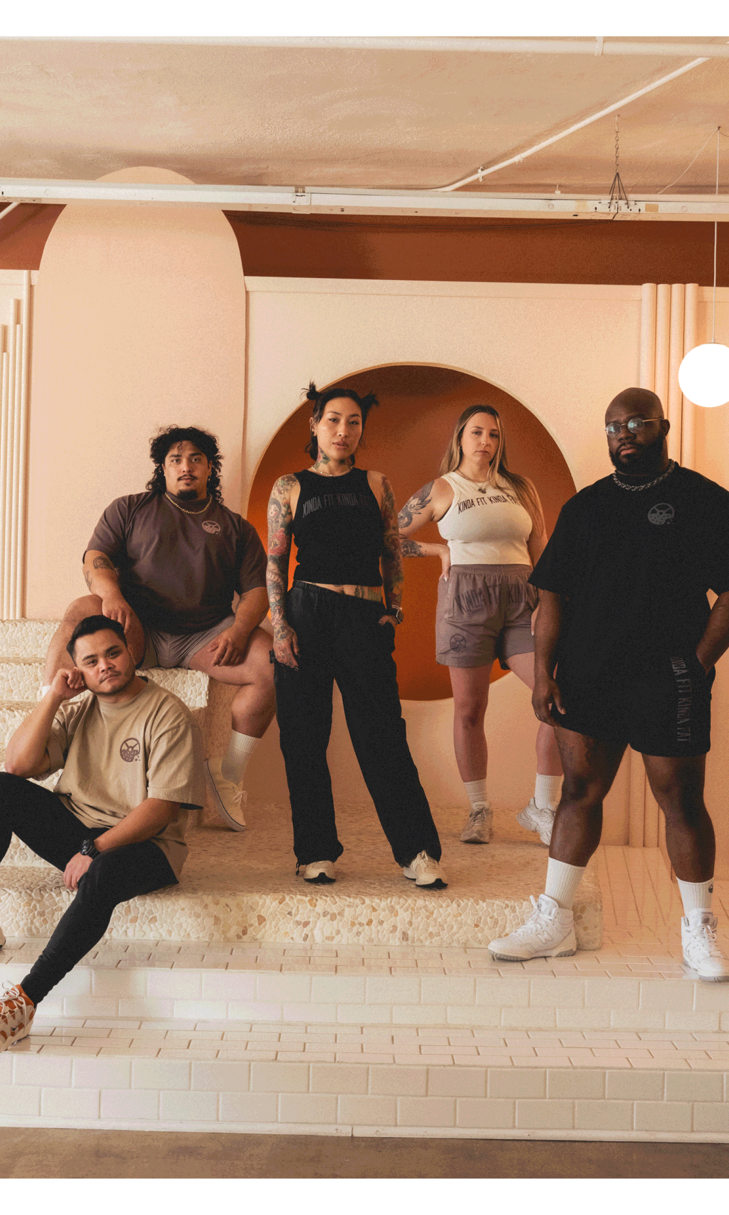 Diverse athletes in size-inclusive KFKF fitness apparel celebrating body diversity in strength sports