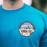 Kinda Fit Kinda Fat Premium Unisex Turquoise T-shirt. Original KFKF Cookie Logo on front left chest. Kinda Fit Kinda Fat Bar Logo Back. 