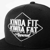 Close-up of Kinda Fit Kinda Fat Diamond Drip Logo on the Unisex Black Snapback Hat. Front shot. drip font
